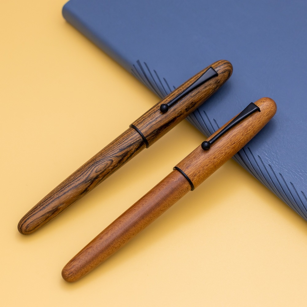 Wooden, black pen holder with threaded mechanism for rotating the pen