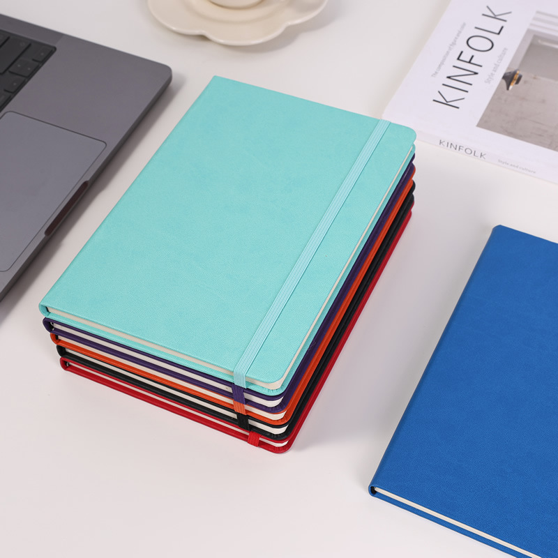 Leather-like straps and elastic bands give this PU-coated notebook a simple yet stylish appearance.