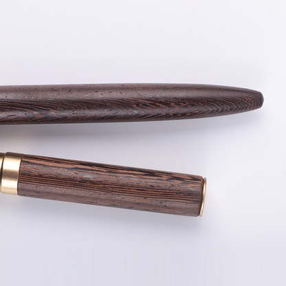 Brass, wooden, and iridium-plated gold pen with ink sac