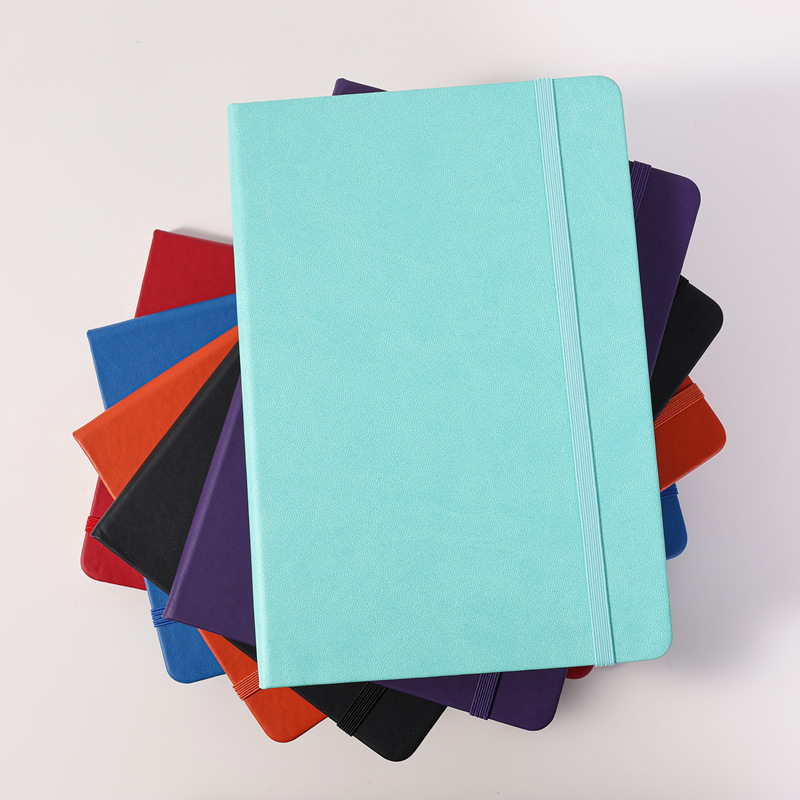 Leather-like straps and elastic bands give this PU-coated notebook a simple yet stylish appearance.