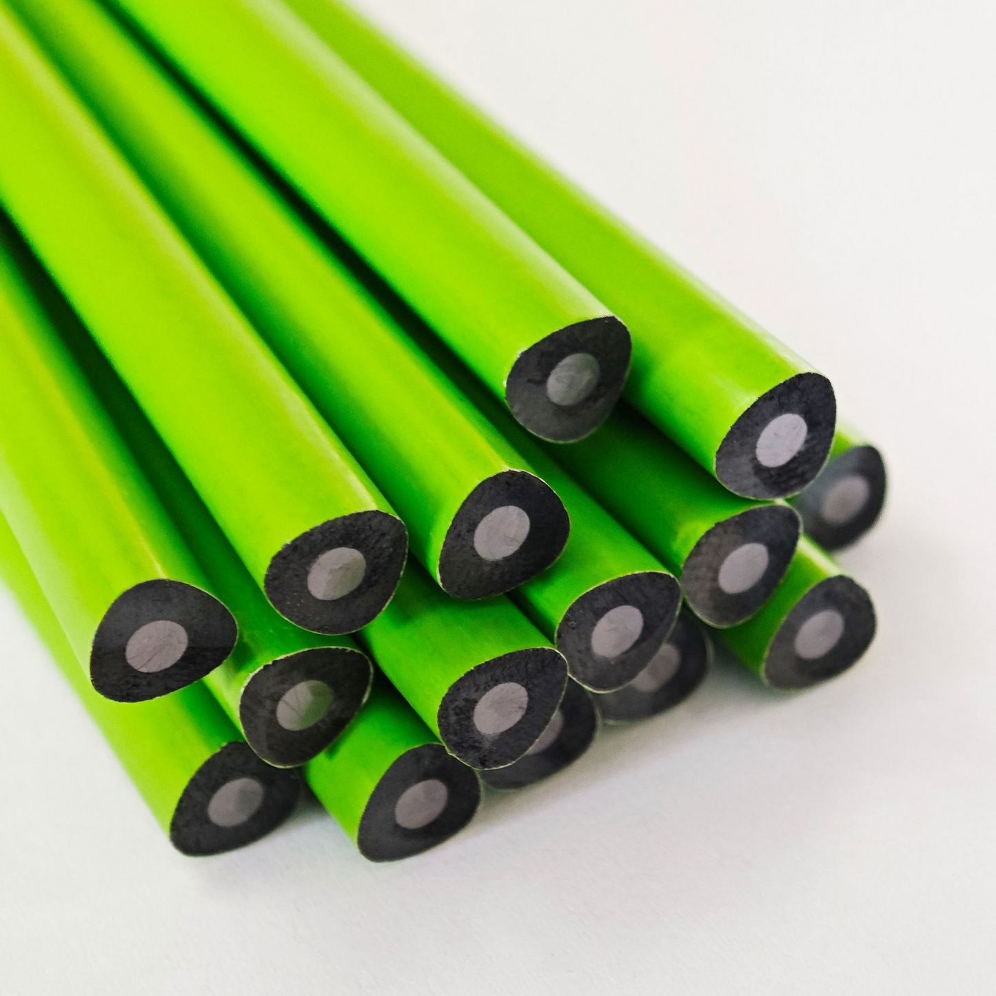 Wooden, small, green, tri-colored painted triangular pencil cases – high-quality HB2B pencils for students and school supplies.