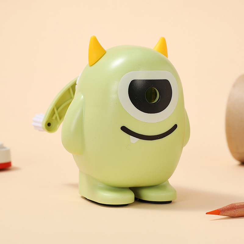 Monster-themed cartoon pencil sharpener, suitable for primary school students to use for sharpening pencils – hand-cranked type.