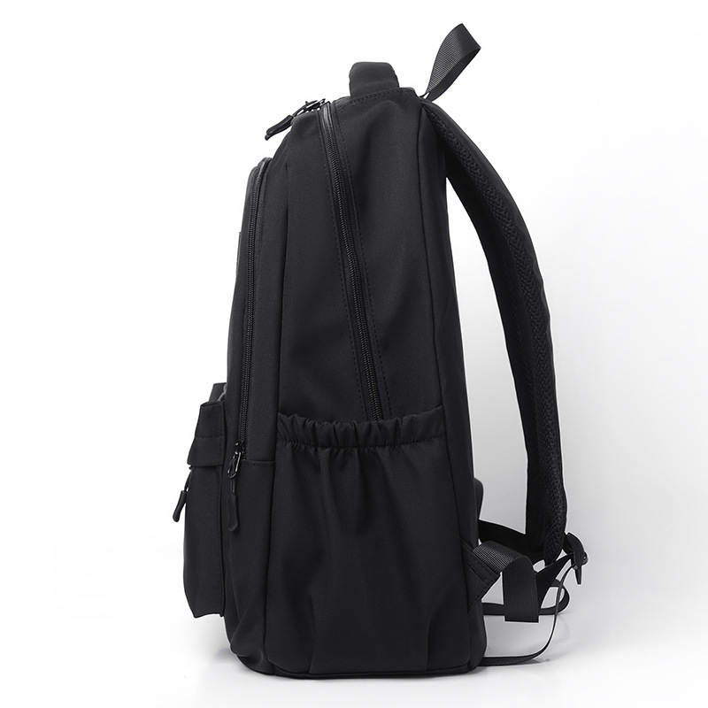 Lightweight travel backpack with large capacity, suitable for junior high, high school, and college students.