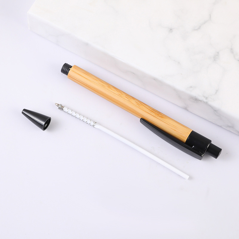 Bamboo and wood ballpoint pen with colored pen holder – an eco-friendly bamboo pen.