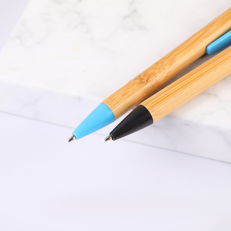 Bamboo and wood ballpoint pen with colored pen holder – an eco-friendly bamboo pen.