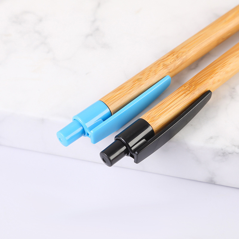 Bamboo and wood ballpoint pen with colored pen holder – an eco-friendly bamboo pen.