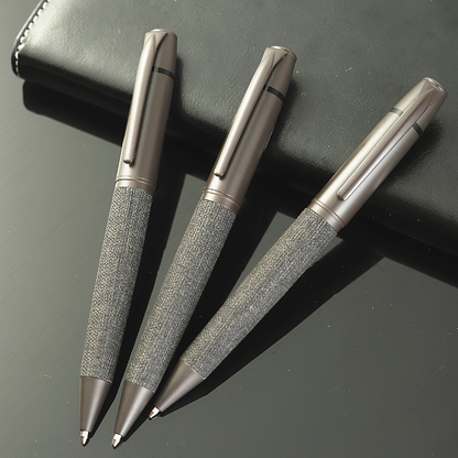 Metal, oil-based ballpoint pen with a rotary bullet tip for office use