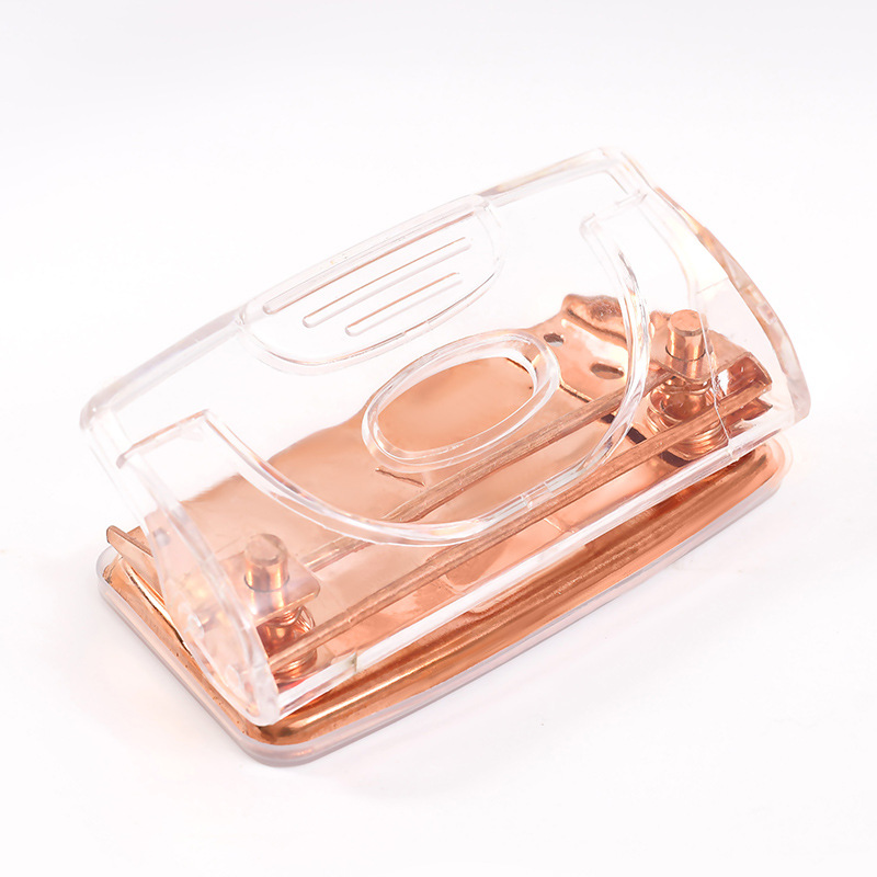Rose gold metallic transparent manual double-hole loose-leaf notebook hole punch for students and office supplies.