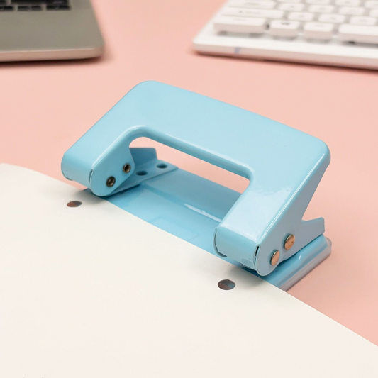 Macaron double hole puncher, manual hole puncher for student stationery, office binder, journal puncher, circular hole puncher.