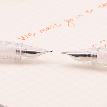 Transparent piston, artistically designed, with a pointed tip and made of steel.