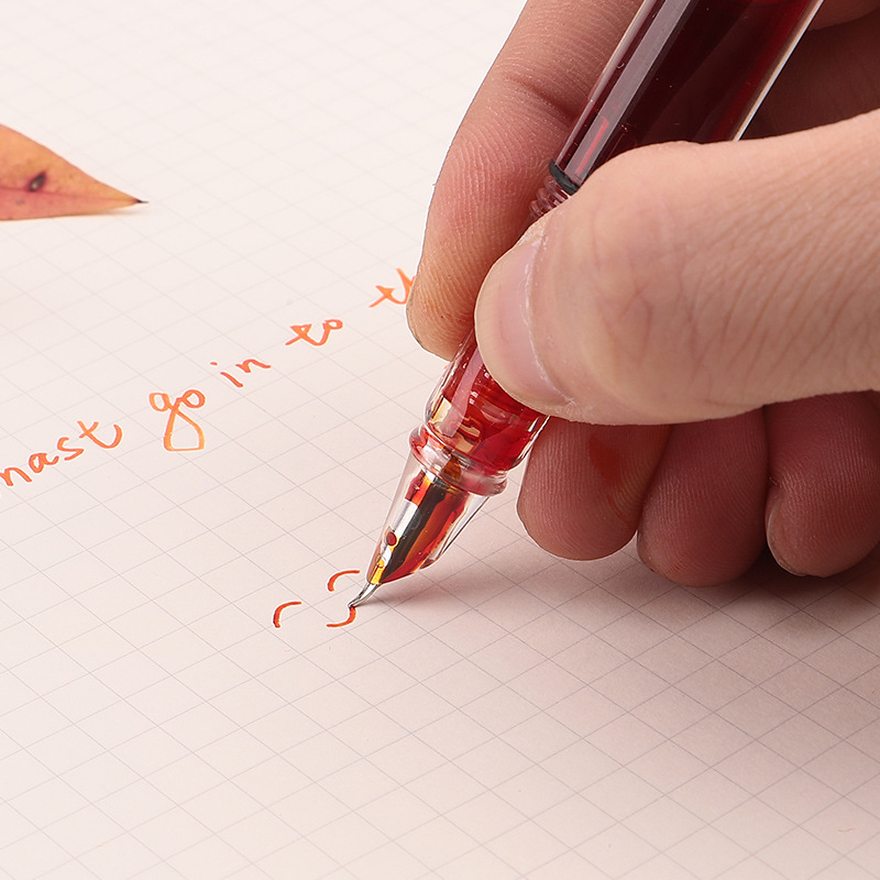 Transparent piston, artistically designed, with a pointed tip and made of steel.