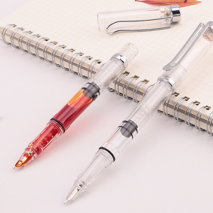 Transparent piston, artistically designed, with a pointed tip and made of steel.